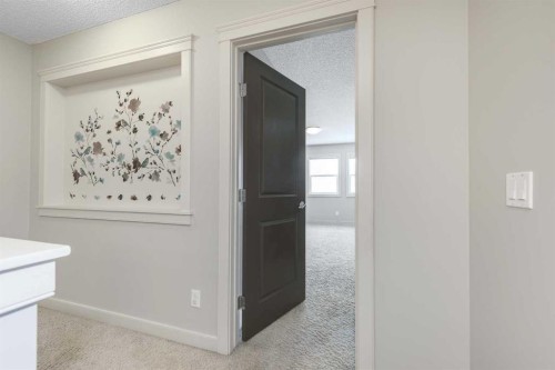 124 Evanscove Manor Nw, Calgary, AB - Indoor Photo Showing Other Room