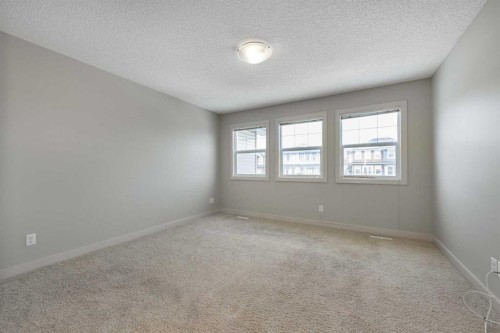 124 Evanscove Manor Nw, Calgary, AB - Indoor Photo Showing Other Room