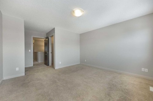 124 Evanscove Manor Nw, Calgary, AB - Indoor Photo Showing Other Room