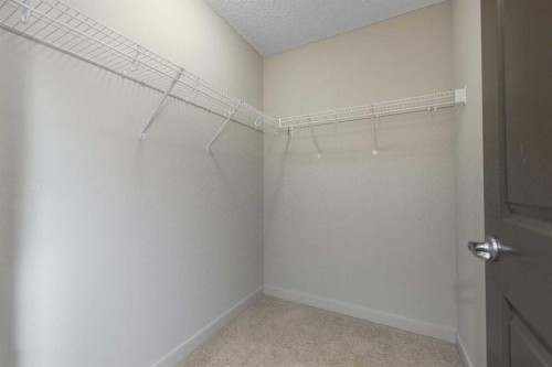 124 Evanscove Manor Nw, Calgary, AB - Indoor With Storage
