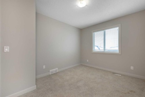 124 Evanscove Manor Nw, Calgary, AB - Indoor Photo Showing Other Room