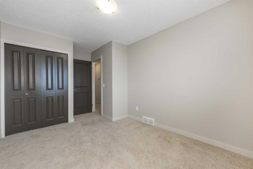124 Evanscove Manor Nw, Calgary, AB - Indoor Photo Showing Other Room