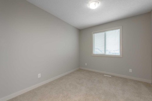 124 Evanscove Manor Nw, Calgary, AB - Indoor Photo Showing Other Room