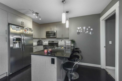 1404-240 Skyview Ranch Road Ne, Calgary, AB - Indoor Photo Showing Kitchen With Stainless Steel Kitchen With Upgraded Kitchen