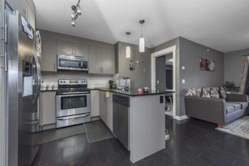 1404-240 Skyview Ranch Road Ne, Calgary, AB - Indoor Photo Showing Kitchen With Stainless Steel Kitchen