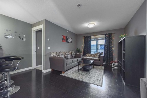 1404-240 Skyview Ranch Road Ne, Calgary, AB - Indoor Photo Showing Living Room