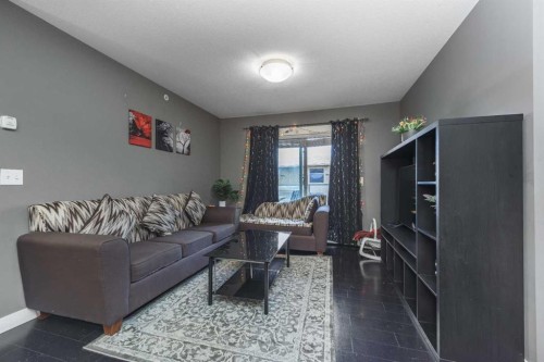 1404-240 Skyview Ranch Road Ne, Calgary, AB - Indoor Photo Showing Living Room