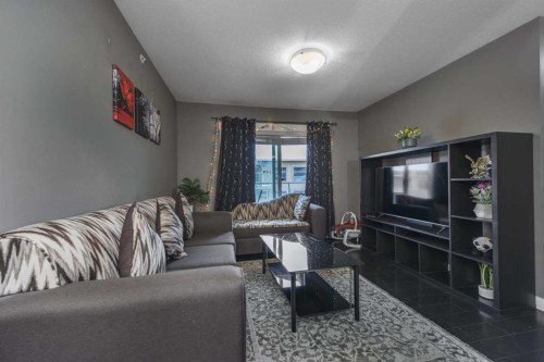 1404-240 Skyview Ranch Road Ne, Calgary, AB - Indoor Photo Showing Living Room