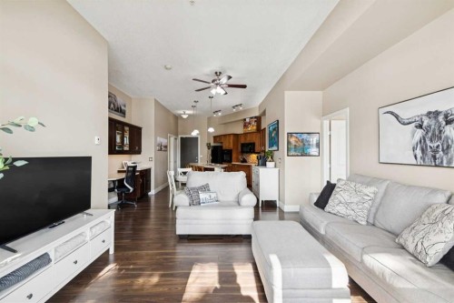 103-3101 34 Avenue Nw, Calgary, AB - Indoor Photo Showing Living Room