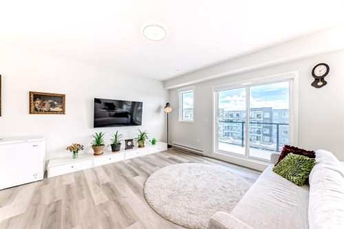 1402-33 Carringham Gate Nw, Calgary, AB - Indoor Photo Showing Living Room