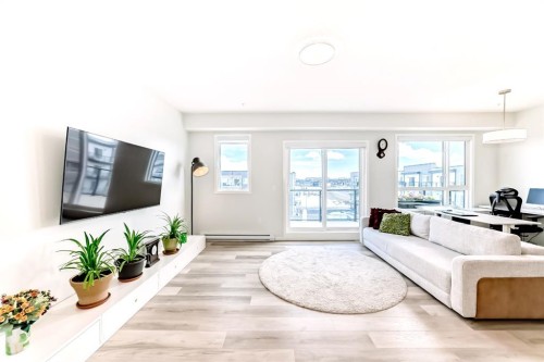 1402-33 Carringham Gate Nw, Calgary, AB - Indoor Photo Showing Living Room
