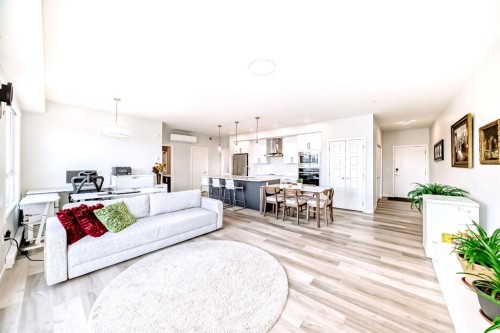 1402-33 Carringham Gate Nw, Calgary, AB - Indoor Photo Showing Living Room
