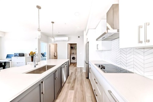 1402-33 Carringham Gate Nw, Calgary, AB - Indoor Photo Showing Kitchen With Upgraded Kitchen