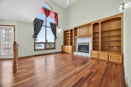 90 Hawkmount Green Nw, Calgary, AB - Indoor With Fireplace