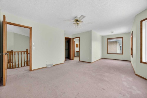 90 Hawkmount Green Nw, Calgary, AB - Indoor Photo Showing Other Room