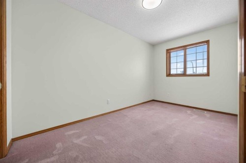 90 Hawkmount Green Nw, Calgary, AB - Indoor Photo Showing Other Room