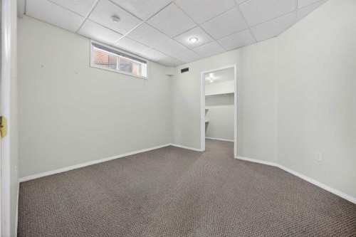 90 Hawkmount Green Nw, Calgary, AB - Indoor Photo Showing Other Room