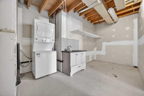 90 Hawkmount Green Nw, Calgary, AB - Indoor Photo Showing Laundry Room