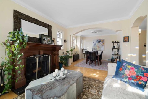 1727 24 Street Sw, Calgary, AB - Indoor Photo Showing Living Room With Fireplace