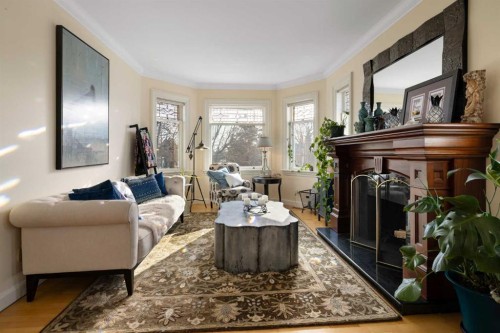 1727 24 Street Sw, Calgary, AB - Indoor Photo Showing Living Room With Fireplace