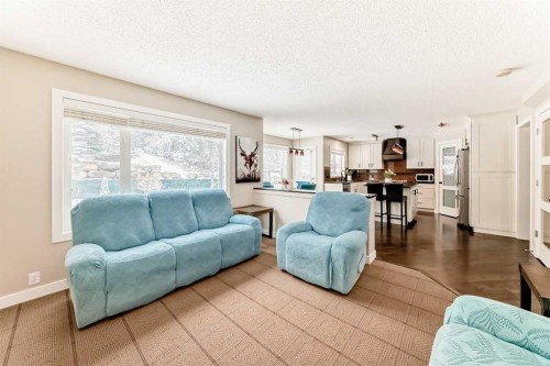 212 Sienna Park Drive Sw, Calgary, AB - Indoor Photo Showing Living Room
