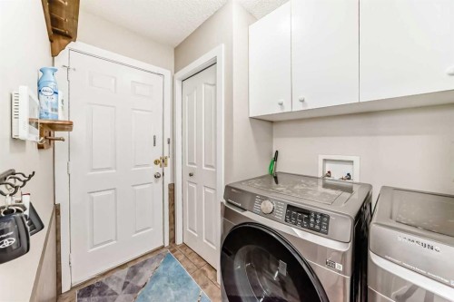 212 Sienna Park Drive Sw, Calgary, AB - Indoor Photo Showing Laundry Room