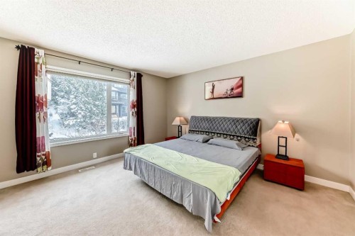 212 Sienna Park Drive Sw, Calgary, AB - Indoor Photo Showing Bedroom