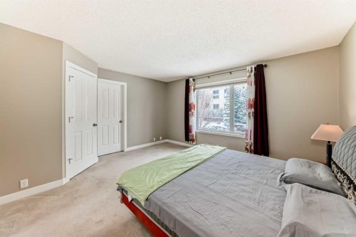 212 Sienna Park Drive Sw, Calgary, AB - Indoor Photo Showing Bedroom
