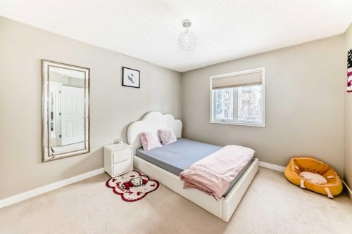 212 Sienna Park Drive Sw, Calgary, AB - Indoor Photo Showing Bedroom