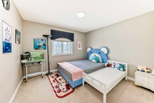 212 Sienna Park Drive Sw, Calgary, AB - Indoor Photo Showing Bedroom