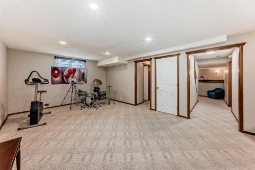 212 Sienna Park Drive Sw, Calgary, AB - Indoor Photo Showing Gym Room