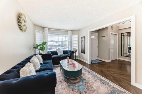 212 Sienna Park Drive Sw, Calgary, AB - Indoor Photo Showing Living Room
