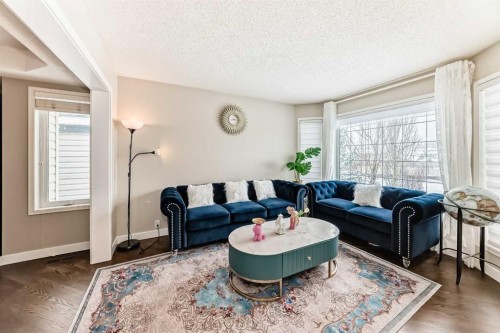 212 Sienna Park Drive Sw, Calgary, AB - Indoor Photo Showing Living Room