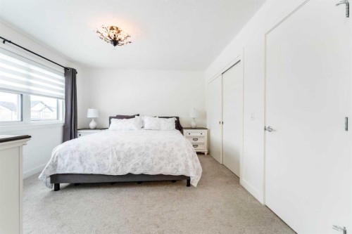 244 Heritage Heights, Cochrane, AB - Indoor Photo Showing Bedroom