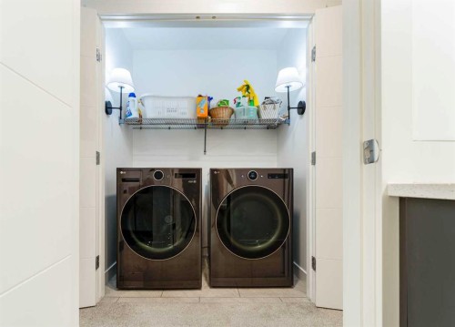 244 Heritage Heights, Cochrane, AB - Indoor Photo Showing Laundry Room