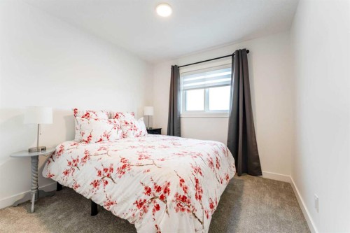 244 Heritage Heights, Cochrane, AB - Indoor Photo Showing Bedroom