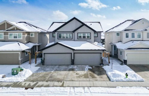 244 Heritage Heights, Cochrane, AB - Outdoor With Facade