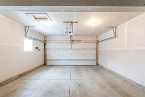 244 Heritage Heights, Cochrane, AB - Indoor Photo Showing Garage