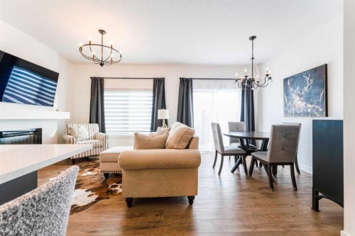244 Heritage Heights, Cochrane, AB - Indoor Photo Showing Living Room With Fireplace