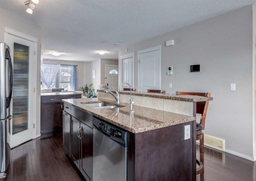 38 Autumn Crescent Se, Calgary, AB - Indoor Photo Showing Kitchen With Stainless Steel Kitchen With Double Sink