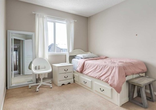 38 Autumn Crescent Se, Calgary, AB - Indoor Photo Showing Bedroom