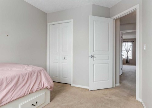 38 Autumn Crescent Se, Calgary, AB - Indoor Photo Showing Bedroom