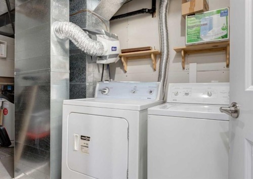38 Autumn Crescent Se, Calgary, AB - Indoor Photo Showing Laundry Room