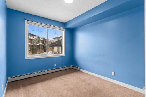 212-10 Panatella Road Nw, Calgary, AB - Indoor Photo Showing Other Room