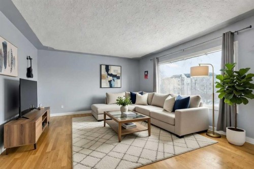 4617 Stanley Road Sw, Calgary, AB - Indoor Photo Showing Living Room