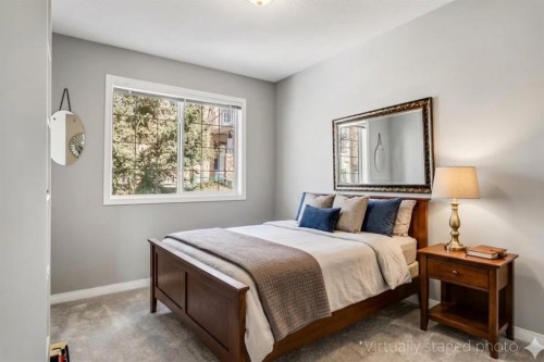 18 Hidden Creek Rise Nw, Calgary, AB - Indoor Photo Showing Bedroom