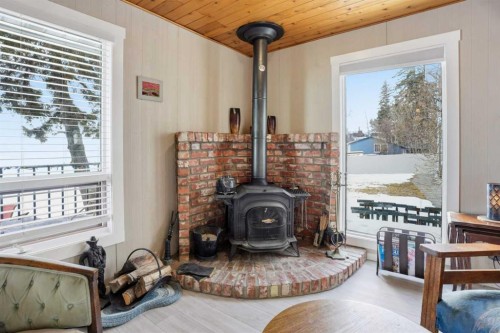 707 7 Street, Ross Haven, AB - Indoor With Fireplace