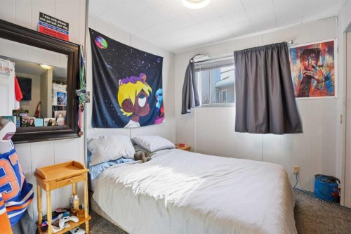707 7 Street, Ross Haven, AB - Indoor Photo Showing Bedroom
