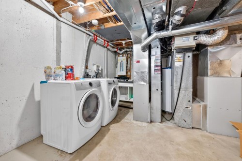 1027 75 Avenue Sw, Calgary, AB - Indoor Photo Showing Laundry Room