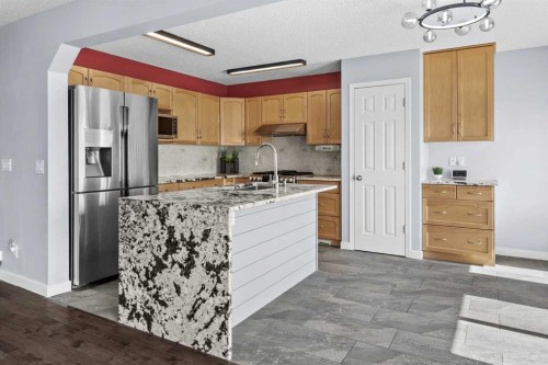 37 Evansbrooke Park Nw, Calgary, AB - Indoor Photo Showing Kitchen With Stainless Steel Kitchen With Double Sink